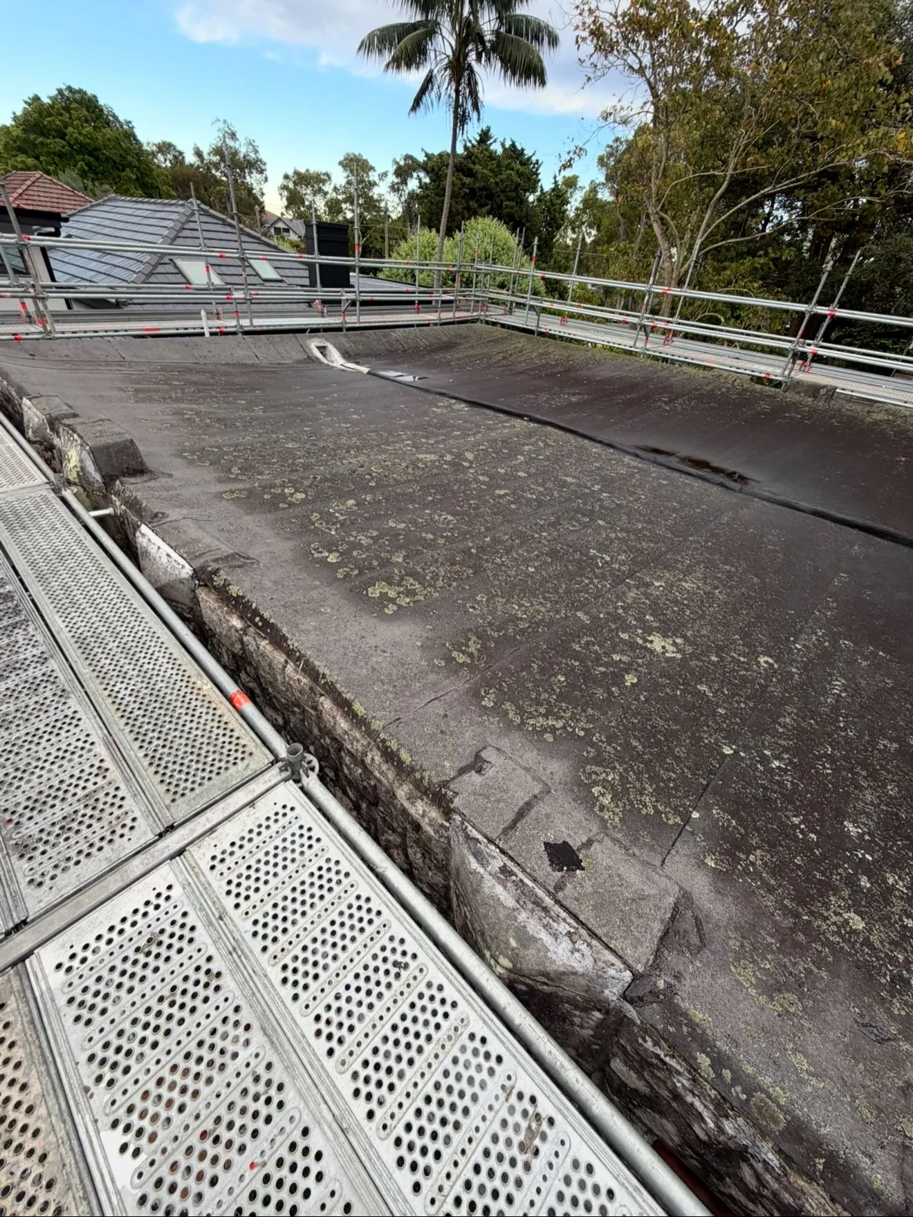Existing weathered membrane on a J.K Waterproofing Solutions roof project